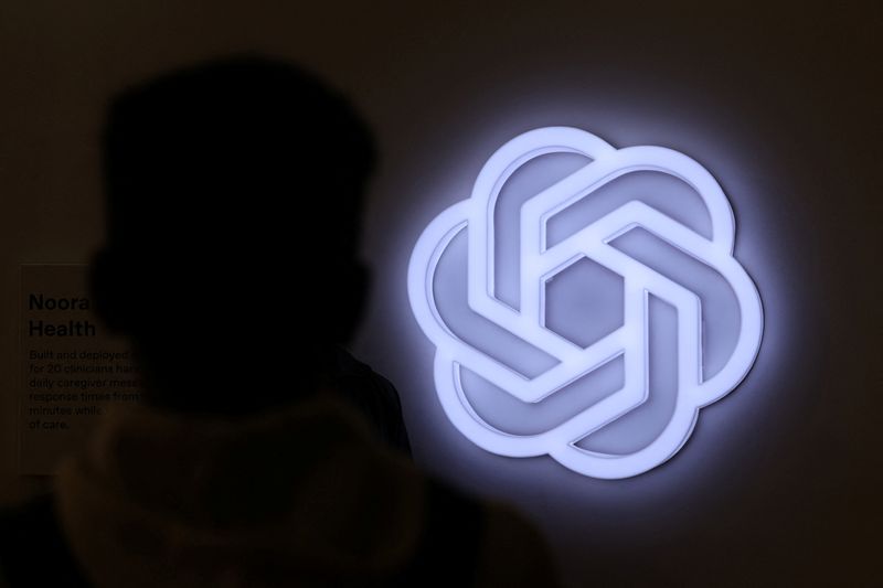 A person stands next to the logo of ChatGPT, an AI-powered chatbot by OpenAI at Bharat Mandapam, one of the venues for AI Impact Summit, in New Delhi, India, February 17, 2026. REUTERS/Bhawika Chhabra