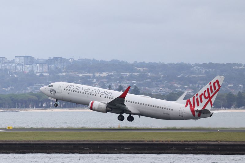 A Virgin Australia aeroplane takes off from Sydney Airport in Sydney, Australia, February 26, 2026. REUTERS/Hollie Adams
