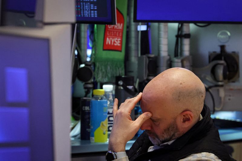 A trader works on the floor at the New York Stock Exchange (NYSE) in New York City, U.S., February 23, 2026.  REUTERS/Brendan McDermid