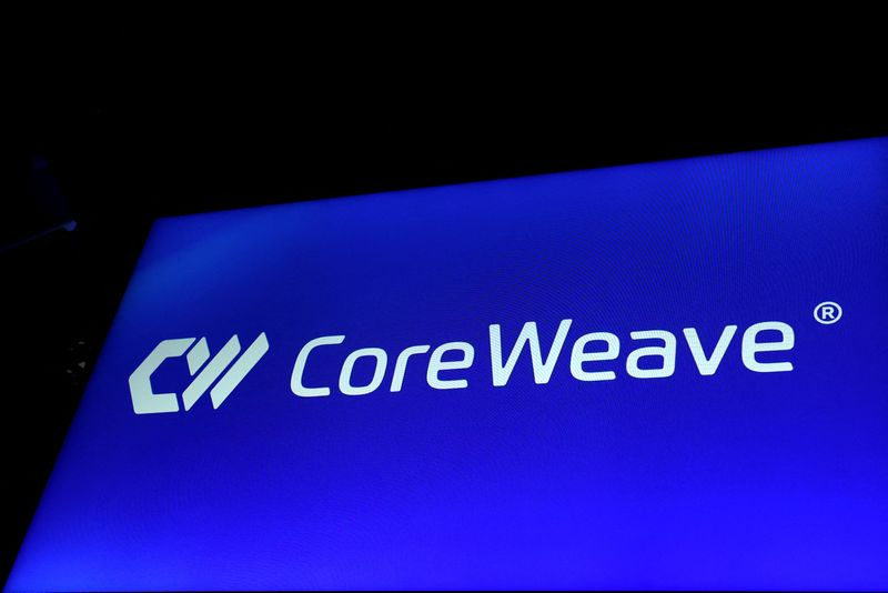 A screen displays the company logo for CoreWeave, Inc., Nvidia-backed cloud services provider, during the company's IPO at the Nasdaq Market, in New York City, U.S., March 28, 2025. REUTERS/Brendan McDermid