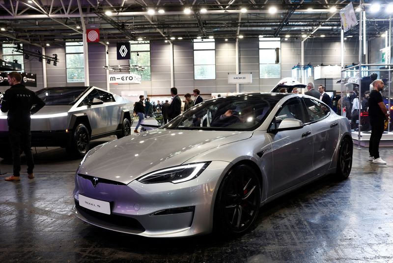 A Tesla Model S electric car is displayed on media day at the 2024 Paris Auto Show in Paris, France, October 14, 2024. REUTERS/Benoit Tessier