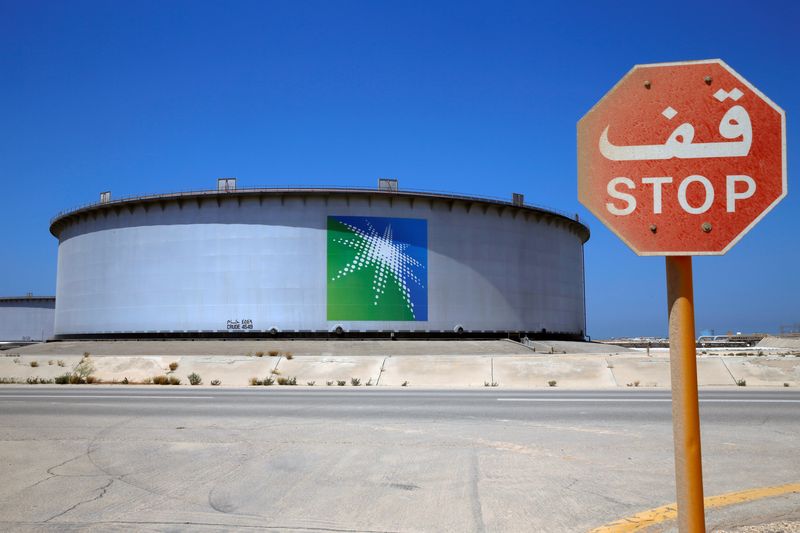 FILE PHOTO: An Aramco tank is seen at Saudi Aramco's Ras Tanura oil refinery and oil terminal in Saudi Arabia May 21, 2018. Picture taken May 21, 2018. REUTERS/Ahmed Jadallah/File Photo