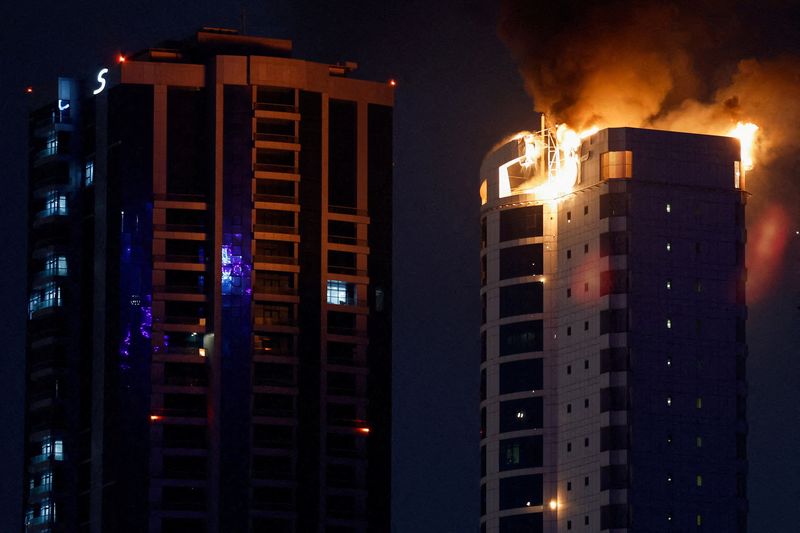 Smoke rises from a burning building hit by an Iranian drone strike, in Seef district, Manama, Bahrain, February 28. REUTERS/Hamad I Mohammed