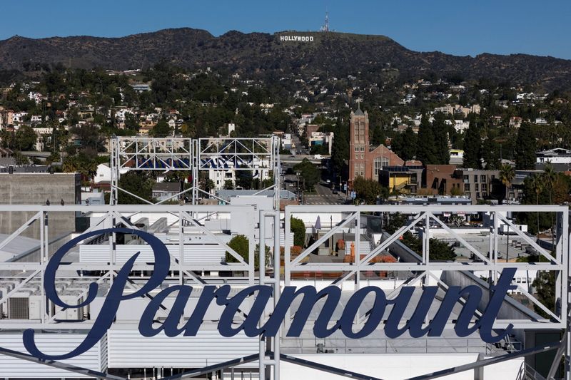 A drone view shows a sign for Paramount in front of the Hollywood sign in Los Angeles, California, December 8, 2025. REUTERS/Daniel Cole