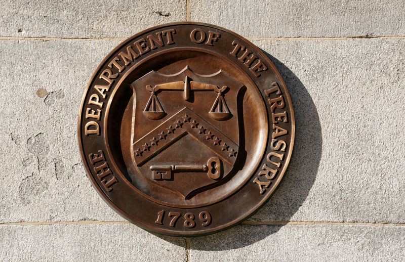 FILE PHOTO: A bronze seal for the Department of the Treasury is shown at the U.S. Treasury building in Washington, U.S., January 20, 2023. REUTERS/Kevin Lamarque/File Photo