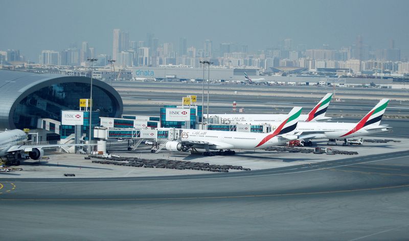 FILE PHOTO: Emirates aircraft are seen at the Emirates Terminal at Dubai International Airport, February 10, 2013. REUTERS/Jumana El Heloueh/File Photo