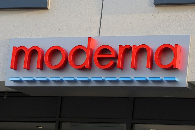 FILE PHOTO: A sign marks the headquarters of Moderna in Cambridge, Massachusetts, U.S., April 28, 2022.   REUTERS/Brian Snyder/File Photo