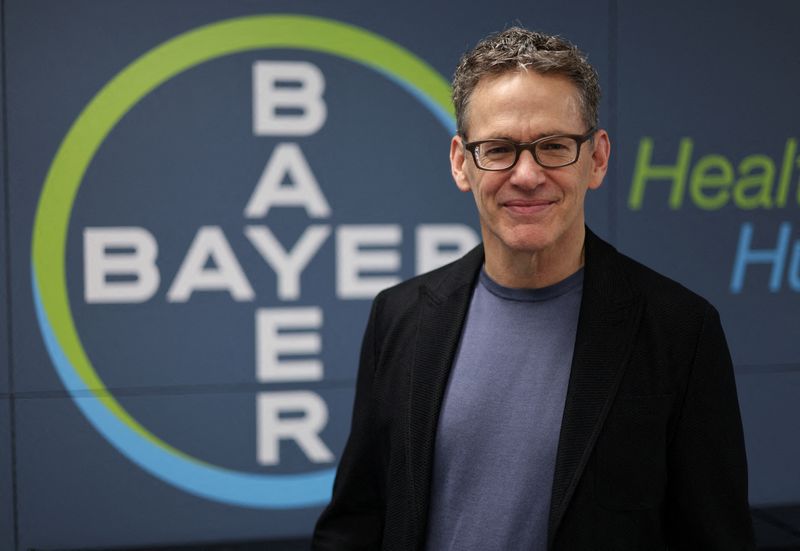 CEO of Germany's drug maker Bayer AG Bill Anderson poses for a portrait in front of the company's logo at the Bayer headquarters in Leverkusen, Germany, December 10, 2024. REUTERS/Wolfgang Rattay