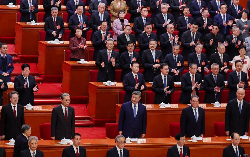 Chinese President Xi Jinping, Chinese Premier Li Qiang, National People's Congress (NPC) Standing Committee Chairman Zhao Leji, Chinese Vice Premier Ding Xuexiang and Politburo Standing Committee member Cai Qi attend the opening session of the Chinese People's Political Consultative Conference (CPPCC) at the Great Hall of the People in Beijing, China March 4, 2026. REUTERS/Maxim Shemetov