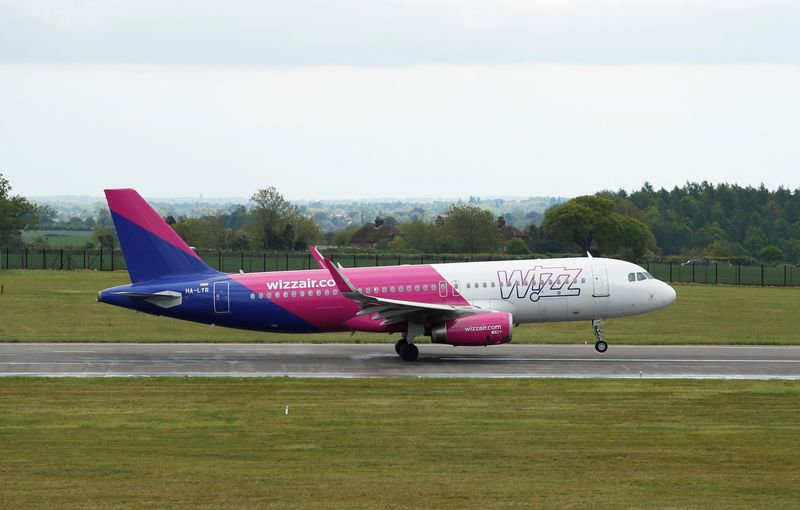 FILE PHOTO: A Wizz Air Airbus A320 takes off from Luton Airport, Britain, May 1, 2020. REUTERS/Andrew Boyers/ File Photo