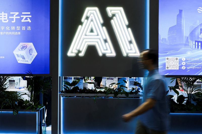 FILE PHOTO: A person visits the World Artificial Intelligence Conference in Shanghai, China July 26, 2025.  REUTERS/Go Nakamura/File Photo