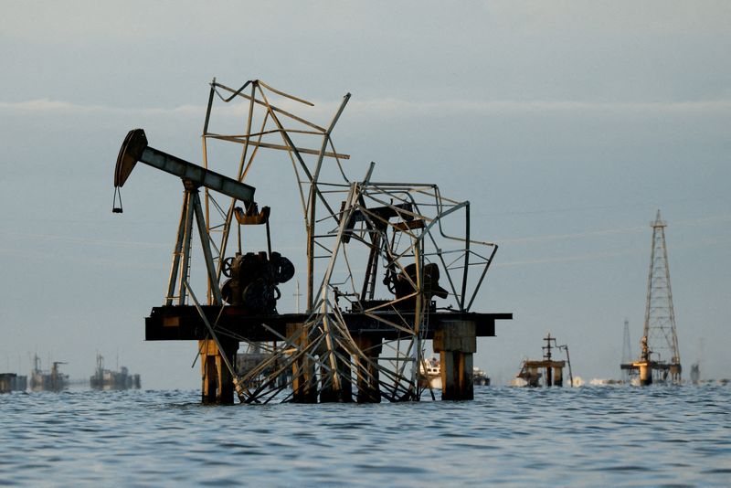 FILE PHOTO: Abandoned pumpjacks damaged over time at a field of state oil company PDVSA on Lake Maracaibo, as residents around the oil‑rich center of Maracaibo in Zulia state remain uncertain about new investments following recent legislative reforms allowing greater private participation in PDVSA and aimed at revitalizing the country’s struggling oil sector, in Cabimas, Venezuela, January 27, 2026. REUTERS/Leonardo Fernandez Viloria/File Photo