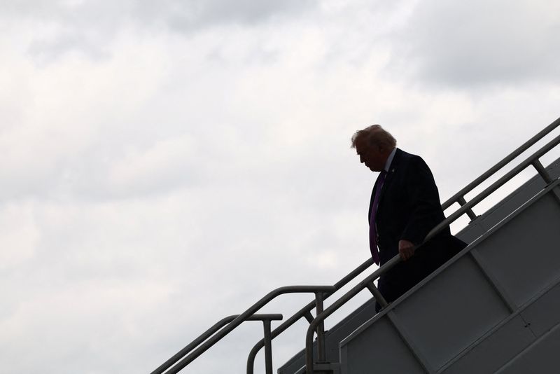 U.S. President Donald Trump arrives at Cincinnati/Northern Kentucky International Airport in Hebron, Kentucky, U.S., March 11, 2026. REUTERS/Kevin Lamarque