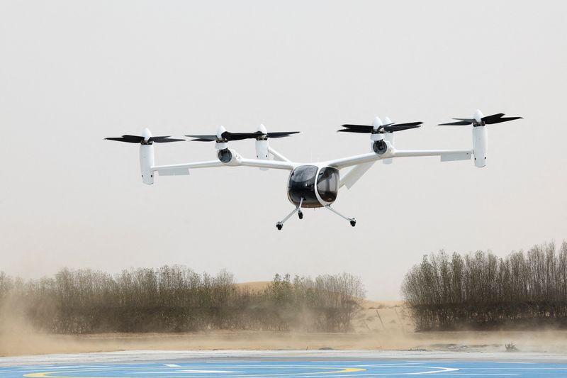 FILE PHOTO: An experimental Joby Dubai Aerial Taxi aircraft lands in Dubai, United Arab Emirates, June 30, 2025. REUTERS/Amr Alfiky/File Photo