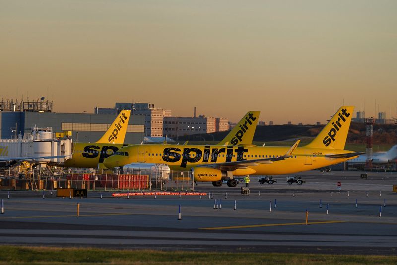 Spirit Airlines airplanes taxi on the tarmac at New York's Laguardia Airport in the Queens borough of New York City, U.S., November 7, 2025. REUTERS/Ryan Murphy/File Photo