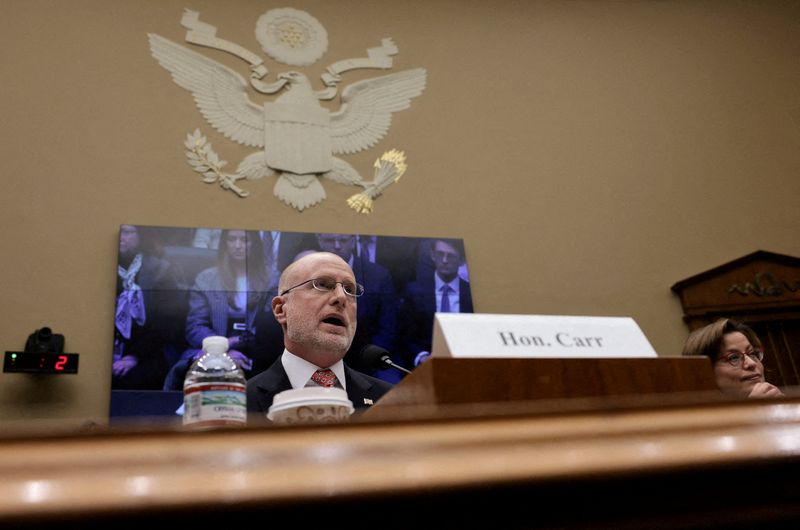 FILE PHOTO: Federal Communications Commission (FCC) Chairman Brendan Carr testifies before a hearing of the U.S. House Energy and Commerce Committee's Communications and Technology Subcommittee on Capitol Hill in Washington, D.C., U.S., January 14, 2026. REUTERS/Jonathan Ernst/File Photo