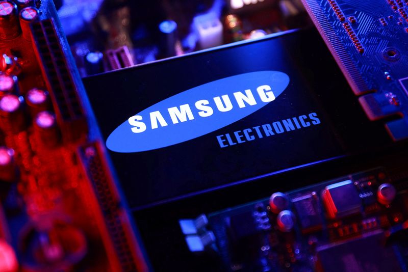 A Samsung Electronics logo and a computer motherboard appear in this illustration taken August 25, 2025. REUTERS/Dado Ruvic/Illustration