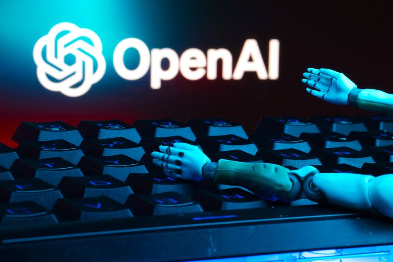 The OpenAI logo, a keyboard, and robot hands are seen in this illustration taken January 27, 2025. REUTERS/Dado Ruvic/Illustration