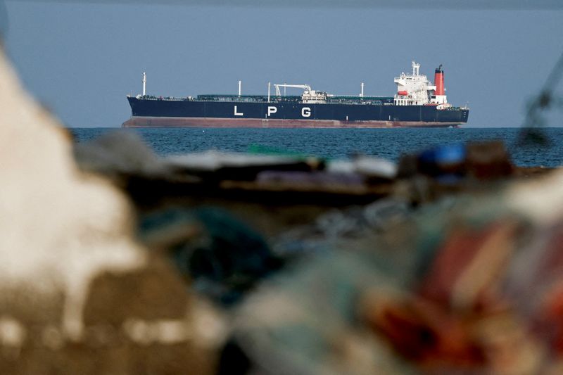 FILE PHOTO: An LPG gas tanker at anchor as traffic is down in the Strait of Hormuz, amid the U.S.-Israeli conflict with Iran, in Shinas, Oman, March 11, 2026. REUTERS/Benoit Tessier/File Photo