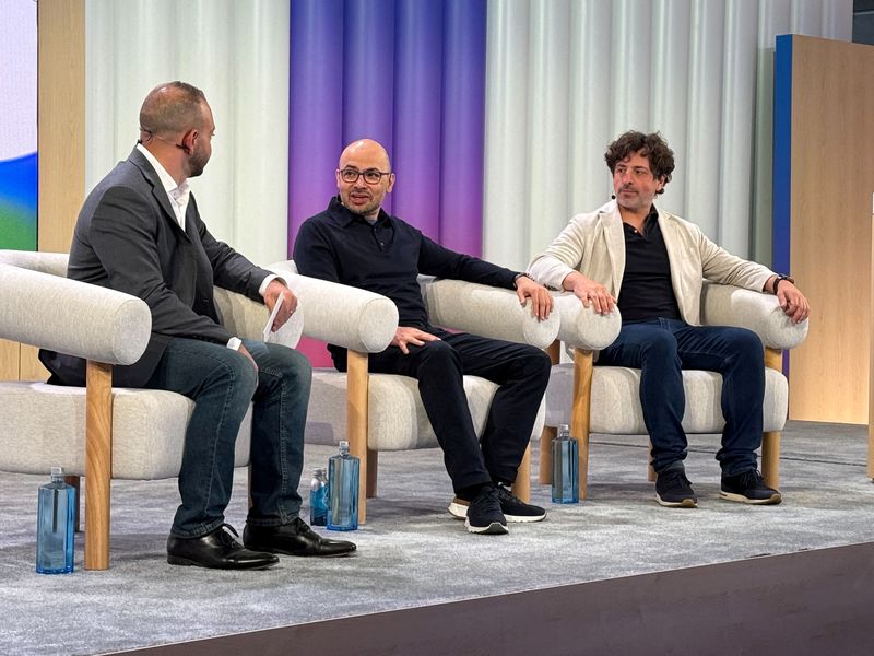 FILE PHOTO: Google DeepMind CEO Demis Hassabis and Google Co-Founder Sergey Brin speak in a fireside chat at the company’s annual developer conference I/O in Mountain View, California, U.S., May 20, 2025. REUTERS/Jeffrey Dastin/File Photo