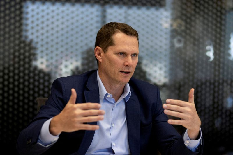 FILE PHOTO: President of BHP Americas, Brandon Craig, poses for a picture during an interview with Reuters, in Santiago, Chile November 21, 2024. REUTERS/Pablo Sanhueza//File Photo