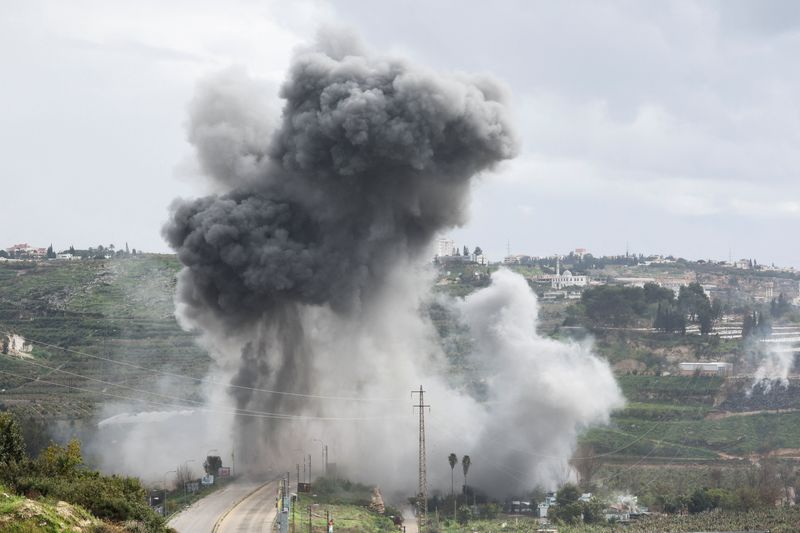 Smoke rises after an Israeli strike on a bridge, following an escalation between Hezbollah and Israel, amid the U.S.-Israeli conflict with Iran, near Qasmiyeh, Lebanon, March 22, 2026. REUTERS/Amr Abdallah Dalsh