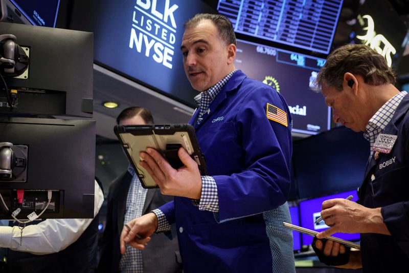 Traders work on the floor at the New York Stock Exchange (NYSE) in New York City, U.S., February 13, 2026.  REUTERS/Brendan McDermid