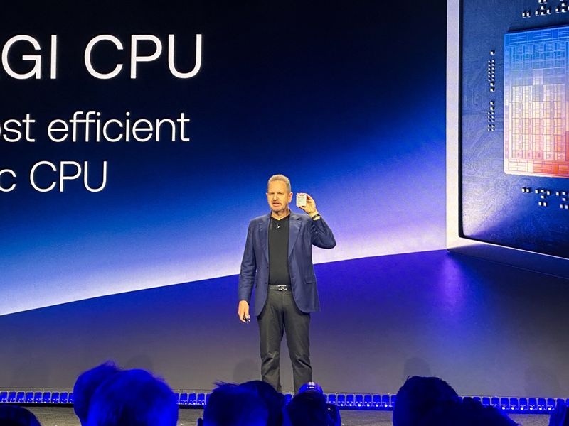 Arm Holdings CEO Rene Haas holds up the company's AGI CPU during an event in San Francisco, California, U.S., March 24, 2026. REUTERS/Max A. Cherney