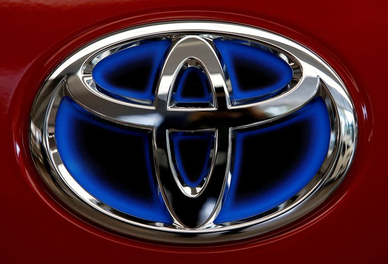 FILE PHOTO: Toyota Motor's logo on the Estima Hybrid model is pictured at the automaker's headquarters in Tokyo, Japan, February 6, 2017.  REUTERS/Kim Kyung-Hoon/File Photo