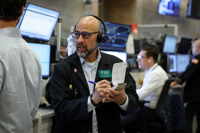 Futures-options traders work on the floor at the New York Stock Exchange's NYSE American (AMEX) in New York City, U.S., March 23, 2026.  REUTERS/Brendan McDermid