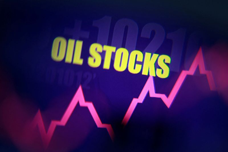 Rising stock graph and the words "Oil Stocks" are seen in this illustration taken March 23, 2026. REUTERS/Dado Ruvic/Illustration