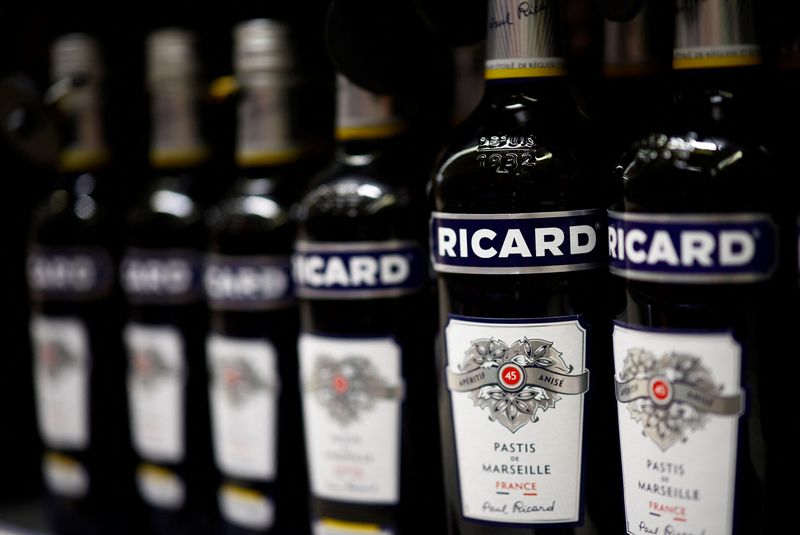 Bottles of Ricard, aniseed-flavoured beverage, are displayed on shelves in a supermarket in Chanverrie, France, October 16, 2024. REUTERS/Stephane Mahe