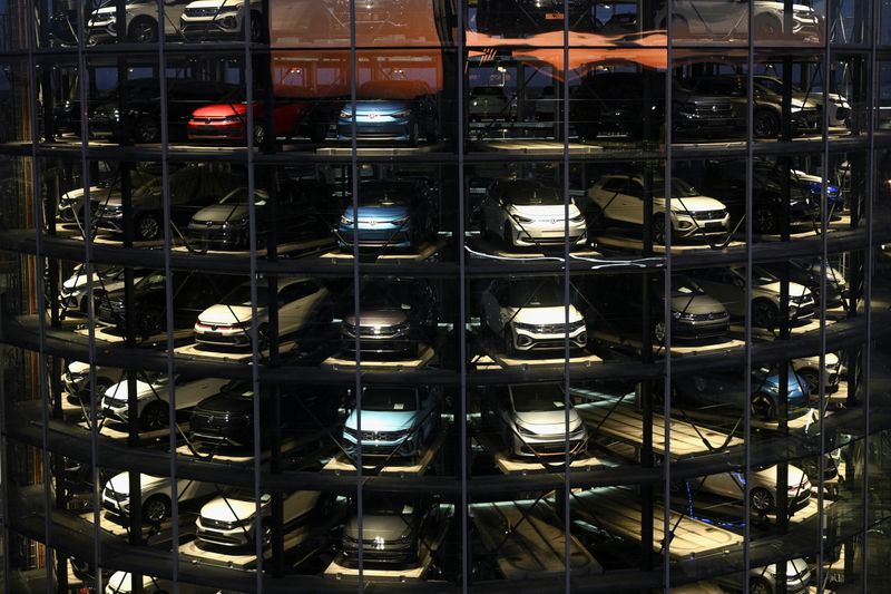 A Volkswagen car delivery tower at the German carmaker's plant in Wolfsburg, Germany, November 21, 2025. Photo taken through glass. REUTERS/Annegret Hilse
