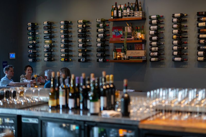 Customer begins their meal at the L.A. restaurant “Wife and the Somm” in Los Angeles, California, U.S. March 26, 2026.   REUTERS/ Mike Blake