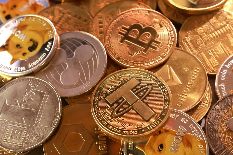 Representation of cryptocurrencies are seen in this illustration taken September 10, 2025. REUTERS/Dado Ruvic/Illustration