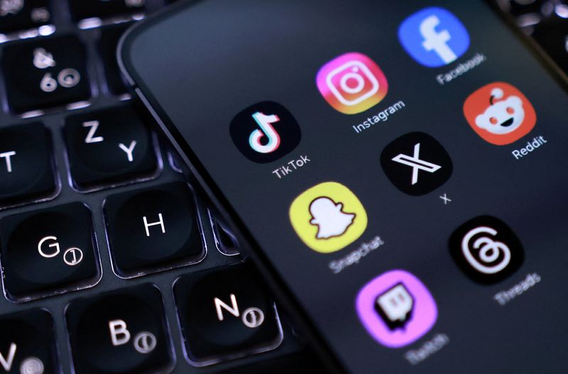 A smartphone with displayed social app icons in this illustration taken February 3, 2026. REUTERS/Dado Ruvic/Illustration