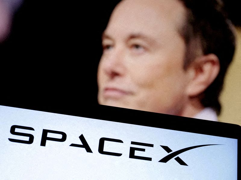 FILE PHOTO: SpaceX's logo and an Elon Musk photo are seen in this illustration created on December 19, 2022. REUTERS/Dado Ruvic/Illustration/File Photo/File Photo