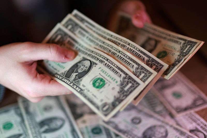 U.S. dollar banknotes are seen in this illustration taken March 24, 2026. REUTERS/Dado Ruvic/Illustration/File Photo