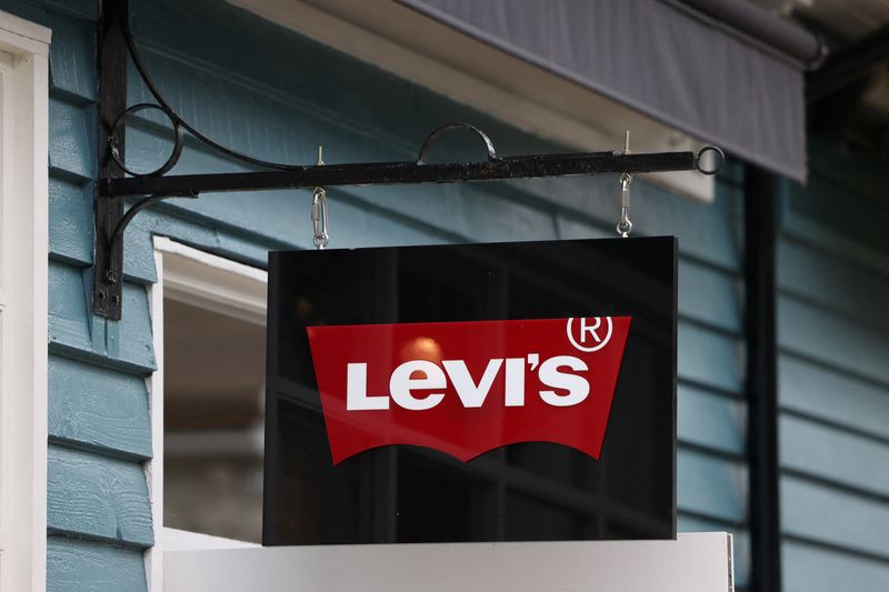 A sign hangs outside the Levi’s outlet retail store at Bicester Village in Oxfordshire, Britain, August 21, 2024. REUTERS/Hollie Adams