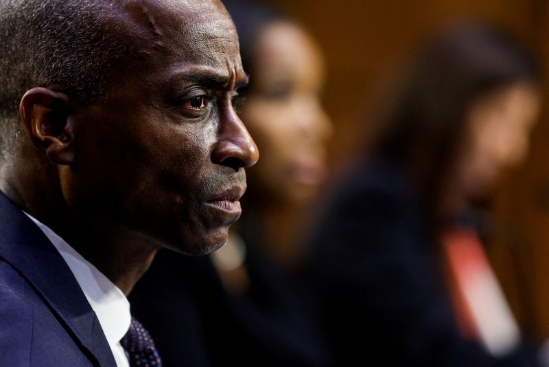FILE PHOTO: Fed Governor Philip Jefferson, nominated to be the Federal Reserve's next vice chair, testifies next to Federal Reserve Board governor nominees Lisa Cook and Adriana Kugler during a Senate Banking Committee nominations hearing on Capitol Hill in Washington, U.S., June 21, 2023. REUTERS/Jonathan Ernst/File Photo