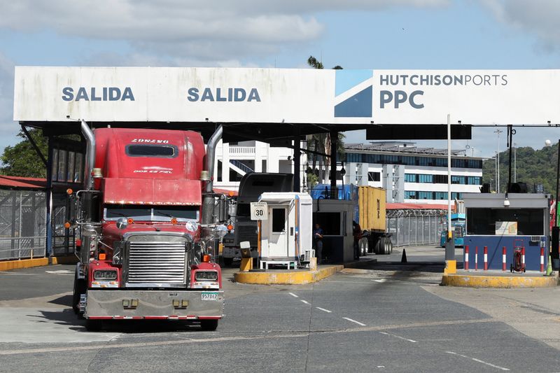 FILE PHOTO: A truck drives past the port gate of Panama Ports Company (PPC) after Panama’s Supreme Court annulled key port contracts held by the Hong Kong‑based CK Hutchison–owned firm, leaving the future of some Panama Canal operations uncertain, in Panama City, Panama, January 30, 2026. REUTERS/Aris Martinez/File Photo