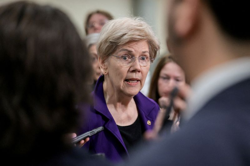 FILE PHOTO: U.S. Senator Elizabeth Warren (D-MA) speaks to reporters, on the day of classified briefings for the Senate Armed Services Committee on Operation Epic Fury and the situation in Iran, on Capitol Hill in Washington, D.C., U.S., March 10, 2026. REUTERS/Kylie Cooper/File Photo