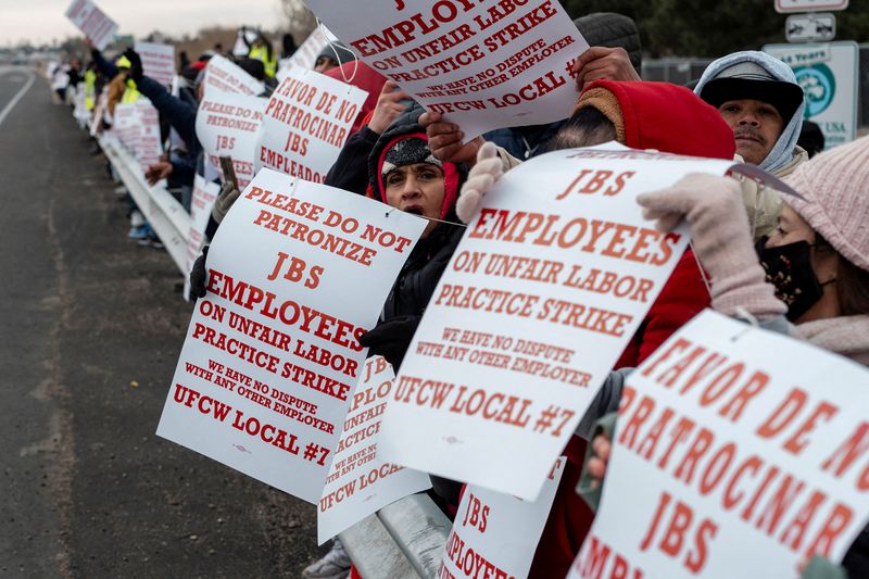 FILE PHOTO: JBS meatpacking workers hold a strike in Greeley, Colorado, U.S. March 16, 2026.  REUTERS/Cheney Orr/File Photo