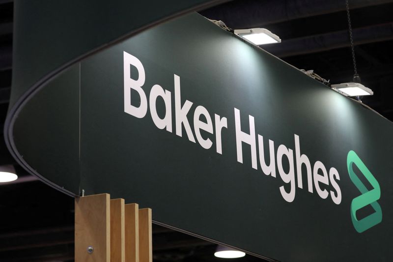 FILE PHOTO: The logo of energy services firm Baker Hughes is displayed during the LNG 2023 energy trade show in Vancouver, British Columbia, Canada, July 12, 2023. REUTERS/Chris Helgren/File Photo