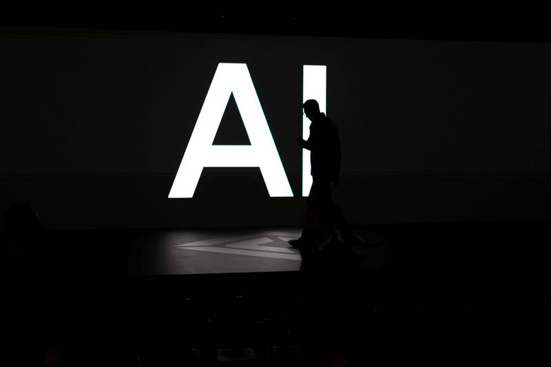 A screen reads 'AI' in Palo Alto, California, U.S., December 11, 2025. REUTERS/Carlos Barria