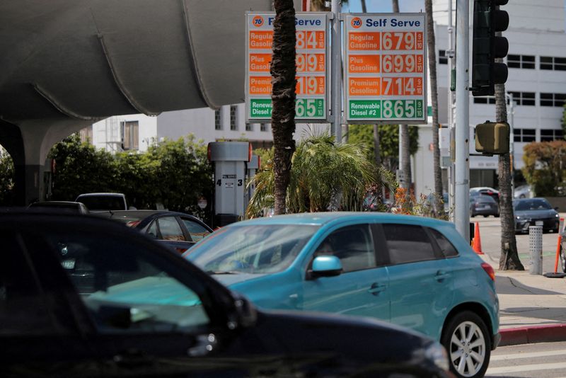 FILE PHOTO: Prices for gasoline in Los Angeles, California U.S., April 2, 2026. REUTERS/Daniel Cole/File Photo