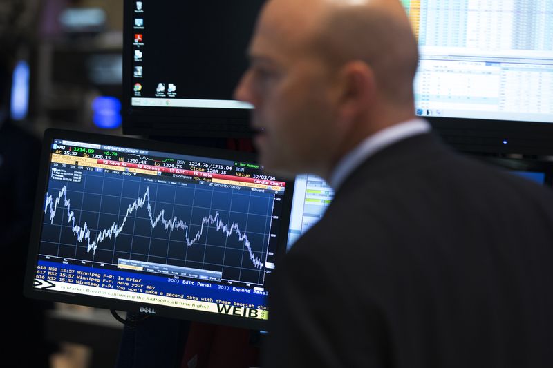 A trader works on the floor of the New York Stock Exchange October 1, 2014. REUTERS/Brendan McDermid