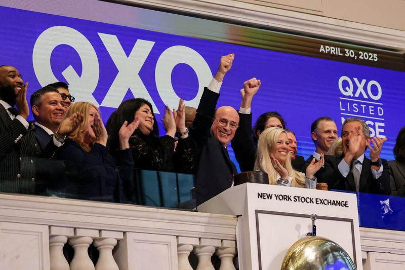 Brad Jacobs, Chairman and CEO of QXO, rings the opening bell at the New York Stock Exchange (NYSE) in New York City, U.S., April 30, 2025.  REUTERS/Brendan McDermid