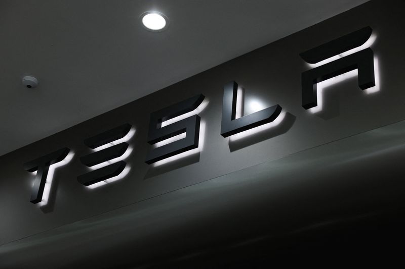 A Tesla logo at the Tesla Gigafactory during a government-organised media trip in Shanghai, China, April 14, 2026. REUTERS/Go Nakamura