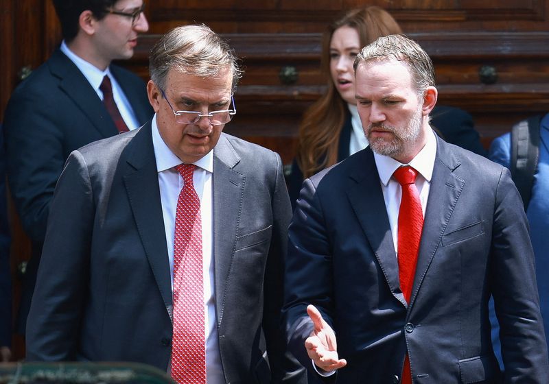 U.S. Trade Representative Jamieson Greer talks with Mexico's Foreign Minister Marcelo Ebrard as they leave National Palace amid talks to review the U.S.-Mexico-Canada trade pact, in Mexico City, Mexico, April 20, 2026. REUTERS/Raquel Cunha